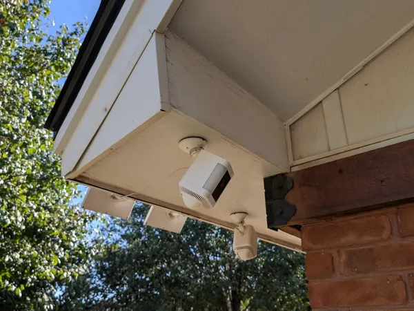 Wireless security cameras under the eaves