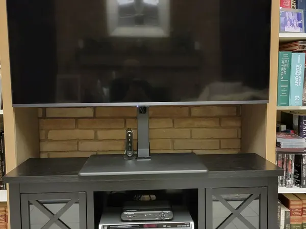 TV and sound system set up in a media center